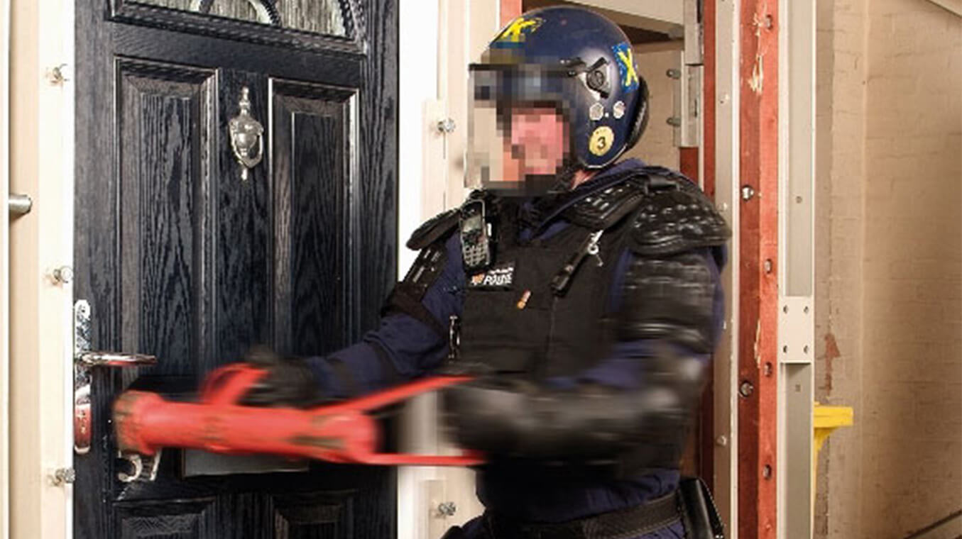Police testing security of front door